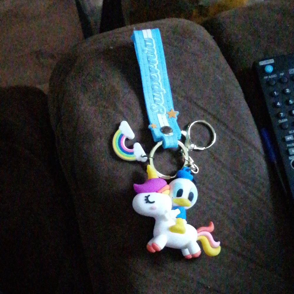 Donald duck on a unicorn keychain NWOT